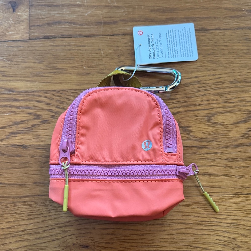 NWT lululemon athletica Coral and Pink Mini Backpack Keychain Pouch